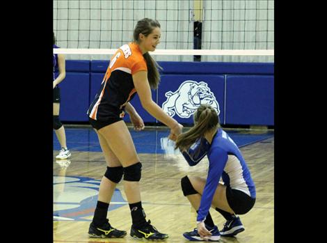 Ronan Maiden Kendra Starkel helps All Star teammate Kaylie Durglo of Mission to  her feet. Starkel had five aces and Durglo added 10 assists.