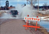 Nowhere to run: Warming air, thawing snow, frozen ground creates flooding throughout county