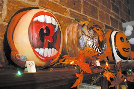 A “screaming” pumpkin, an elf and a Nemo pumpkin are examples of past contest pumpkins.