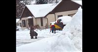 Storm front dumps snow