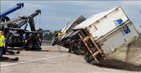 Truck carrying hydrochloric acid flips on Highway 35