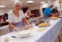 Humble pie: local church assembles pies for apple festival