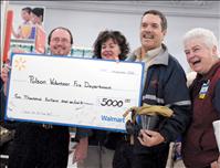 Walmart employees donate to fire department