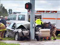 Driver slams into light pole