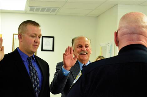 Ronan Reserve Police Officers Robert Stentz and Brandon Smith are sworn in by Police Chief Ken Weaver.
