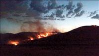 Fire burns over Ravalli Hill