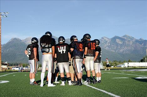 Ronan football teammates created some good unity during their two-a-day workout schedule and are now ready to put their teamwork to use on the field.