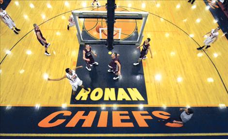 Ronan’s Zachary Wagner puts up two points during the Chiefs’ game against the Hamilton Broncs Friday night. The Chiefs lost the contest by a narrow 57-55 margin. 
