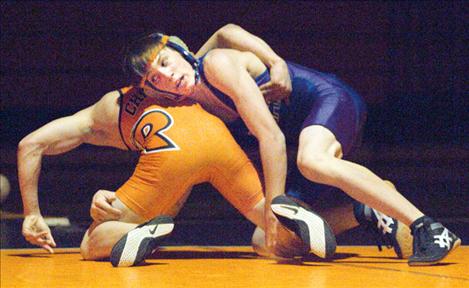 Mission-Charlo wrestler Jamie Mullins gets the better of a Ronan wrestler earler this season. Mullins took third in the 119-pound weight class over Ronan’s Trevor McAllister at the Western B-C Divisionals last weekend.