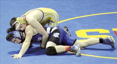Polson wrestler Dylan Moll scores a takedown in his semifinal match against Corvallis’ Gunnar Fairbrother at the Montana all-class wrestling championships held over the weekend in Billings. Moll took second in the state in the 125-pound weight class.
