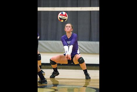 Lady Vikings’  Allie Delaney  bumps the ball.