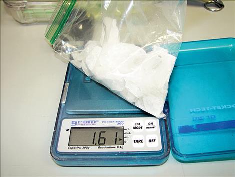 Courtesy photo Methampehtamine seized from the couple's home is weighed by the Lake County Sheriff's Office.