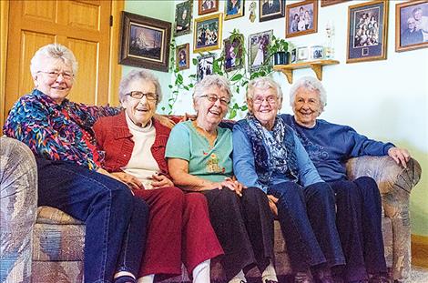 Strong family bonds bring five sisters home