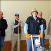 Keith Urbach, Rotary president elect, left, Ken Siler, Rotary president, Jules Clavadetscher, past president, Sharon, Fulton, past president, front, present a check to Bryan River, Loaves and Fish Food Pantry director, for flooring in the receiving area.  