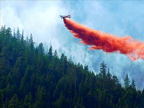 CSKT Division of Fire photo The CSKT Division of Fire uses an air crew team to help put out the fire. 