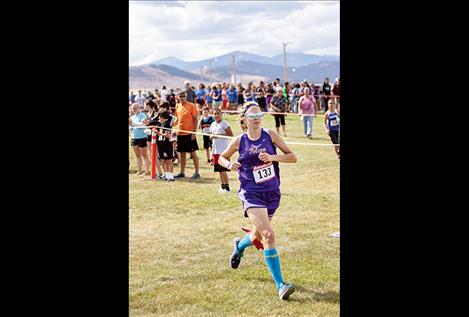 Polson Lady Pirate Beatrix Frissell races to one of her two past weekend race  victories.