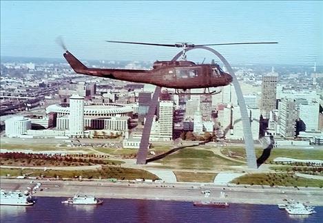 John Moon flies his Huey helicopter.