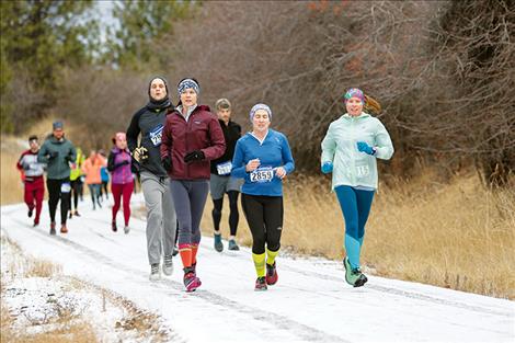 Runners  keep going  through winter  months by  participating  in the  Sorry ‘Bout  That race  in Polson.
