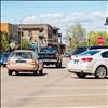 Customers begin to fill the empty streets and open shops in Polson.