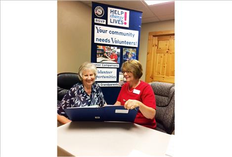 Seeley Swan Resource Specialist Linda Howard, right, meets with Seeley Lake Community Foundation past president Carla Schade in the Seeley Swan Resource Center.