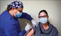 St. Luke staff members receive COVID-19 vaccine