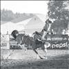 A rank bronc puts on the brakes sending Elmo cowboy Kordell Walker flying.