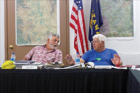 Mission Jocko Irrigation Commissioners Tim Orr and Gene Posivio discuss irrigation concerns during a Sept. 14 meeting in St. Ignatius.