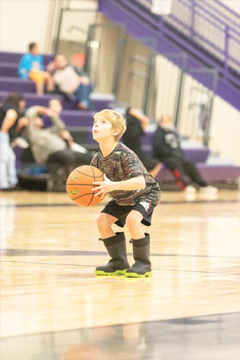 Youngsters take aim at hoop fame during Saturday’s Mission Valley Elks Lodge #1695 annual Hoop Shoot held at Linderman Gymnasium in Polson.