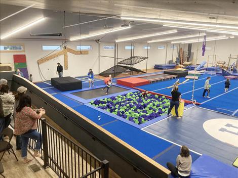 Children play in the gymnastics area in the new Head Over Heels building.