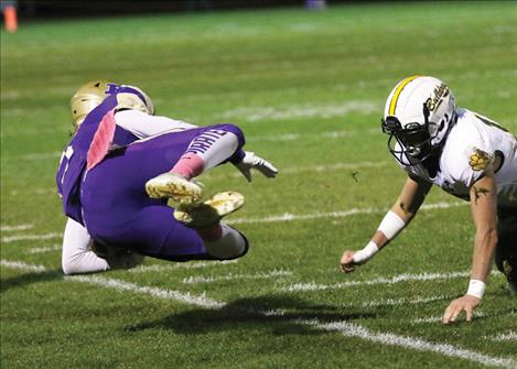 Tanner Wilson gets knocked out of bounds during the Oct. 21 Pirate football game against the Whitefish Bulldogs. 