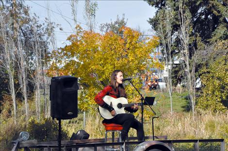 Halladay Quist performs at the Pig in the Park event. 