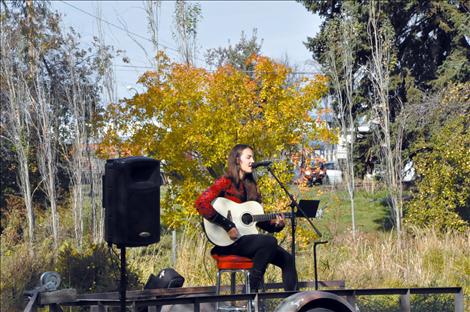 Halladay Quist performs at the Pig in the Park event.