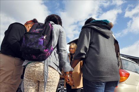 Kicking Horse Job Corps students packed shoeboxes with items to help children have a happy Christmas, then prayed before sending them on their way to one of 130 countries.