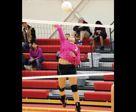 Scarlet Morgan Malatare goes up for the kill.