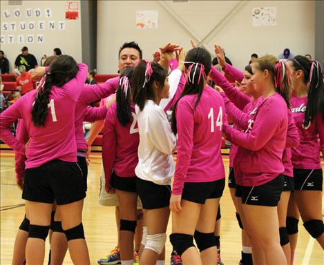 The Arlee Scarlet volleyball team is all business during games.