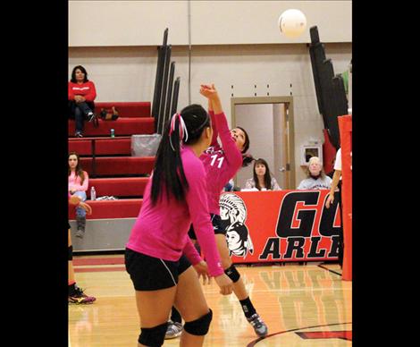 The Arlee Scarlet volleyball team is all business during games.