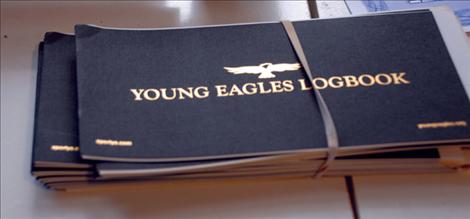 Each Young Eagle receives a logbook to keep track of flying hours.