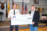 Elks Lodge presents checks to local fire departments