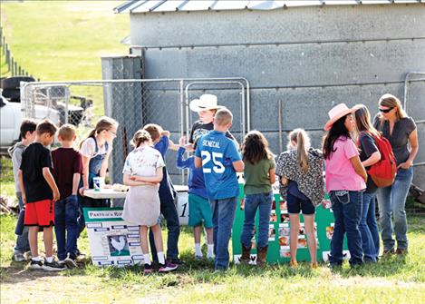 Lina Sturman teaches students about poultry.