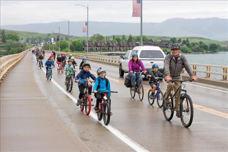 Teacher Doug Crosby leads the herd of biking students on Jun 2.