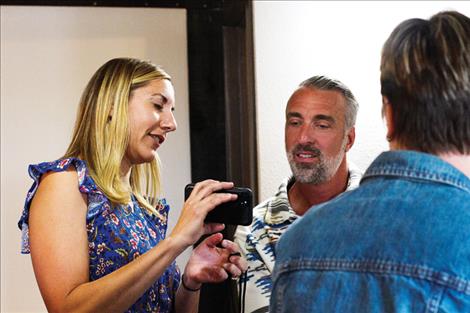 MME Executive Director Lauren Oliver visits with Aaron Atkinson, the CEO of The Arc Western Montana, a similar provider out of Missoula. 