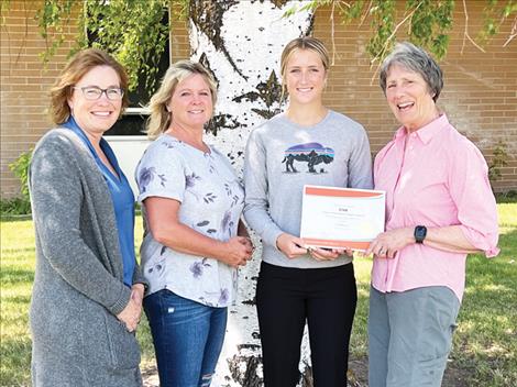 P.E.O. Chapter BY Education Committee presents Tia Mercer with a $2,500 STAR Scholarship for 2023. Pictured from left: Shelley Quinn, Tammy Kelly, Tia and Valerie Lindstrom.