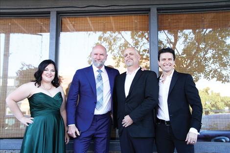 Produer Eden Bryant, lead actor Graham McTavish, writer/director Brandon Smith, and actor Matt Drago meet up before the premiere outside Good Coffee Roasting Co., one of the filming locations. 