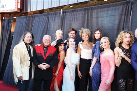 “Somewhere in Montana” cast members pose together on the red carpet. 