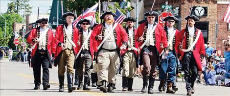 Members of the VFW took to the street on the Fourth of July to reenact the historic battles at Lexington and Concord.