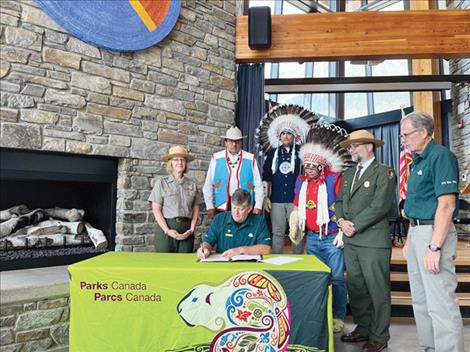 ictured from left to right are: Kate Hammond, intermountain regional director, NPS; Chief Roy Fox of Kainai Nation; Ron Hallman (seated), Parks Canada CEO; Council member Samuel Crowfoot of Siksika Nation; Chief Ouray Crowfoot of Siksika Nation; Superintendent Dave Roemer, Glacier National Park; Superintendent Locke Marshall, Waterton Lake National Park.