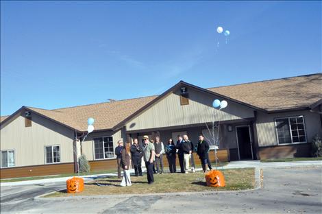 Megan Strickland/Valley Journal Balloons are released at the grand opening of the Big Sky apartments in Charlo. 