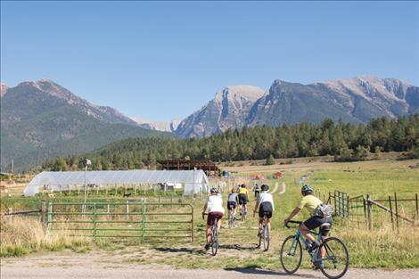 file photo Cyclists pedal into “Awesome Acres” during the 2021 Pedal to Plate event.