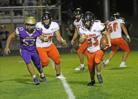 Ronan running back Wiljames Courville looks for a pocket during the Sept. 15 game against Polson.