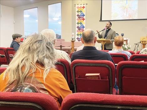 Father Victor Cancino speaks at the MVUMC Peace event.